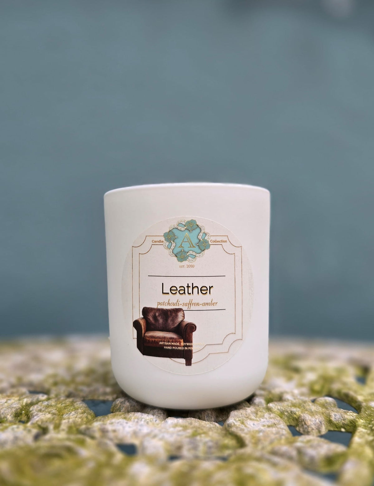 Leather soy wax scented candle in a white jar A Candle Collection